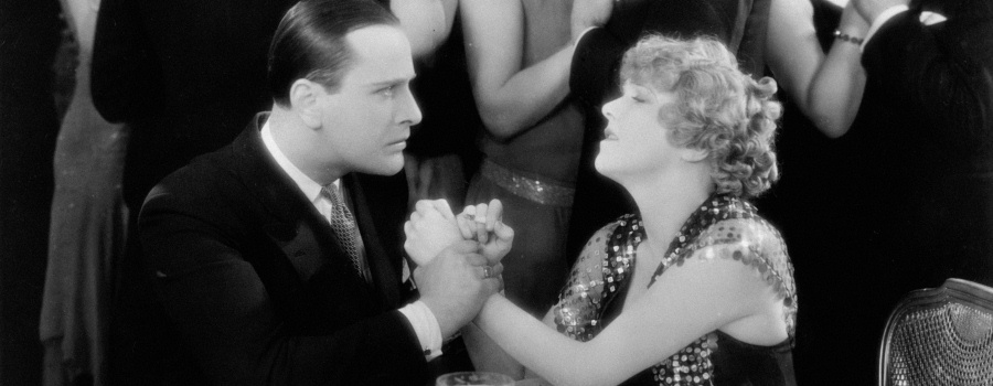 Jean Bradin and Betty Balfour in "Champagne"