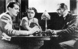 THE LADY VANISHES (1938) - STILL - Publicity still of Michael Redgrave, Margaret Lockwood and Paul Lukas for ''The Lady Vanishes''.