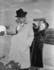 Alfred and Alma Hitchcock (1955) - Photograph of Alma Reville and Alfred Hitchcock, taken aboard the S.S. Liberte in New York on their return from France by photographer Jack Balletti.