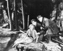 YOUNG AND INNOCENT (1937) - PHOTOGRAPH - Photograph from the mine sequence in ''Young and Innocent'' (Nova Pilbeam, Derrick De Marney, and Edward Rigby).