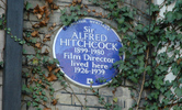 Hitchcock's blue plaque - Photograph of Alfred Hitchcock's blue plaque at 153 Cromwell Road, London.