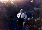 Alfred Hitchcock - Photograph of Alfred Hitchcock relaxing in the rose garden of his house in Scotts Valley.