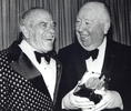 Alfred Hitchcock (1976) - Photograph of directors Frank Capra and Alfred Hitchcock, after Hitchcock was presented with an award at the ''Entertainment '76'' awards special.