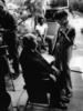 Family Plot (1976) - on set - Photograph of Alfred Hitchcock taking to costume designer Edith Head, taken during the filming of ''Family Plot'' (1976).