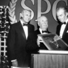 Screen Producers Guild (1965) - Hitchcock accepts the Screen Producers Guild Milestone Award from James Stewart and Cary Grant at an awards ceremony held on 7th March 1965.