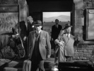 THE PARADINE CASE (1947) - FILM FRAME - Film frame from ''The Paradine Case'' (1947) showing Hitchcock's cameo appearance.