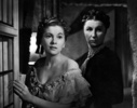 Rebecca (1940) - photograph - Photograph of Joan Fontaine and Judith Anderson in ''Rebecca''.