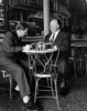 DIAL M FOR MURDER (1954) - PHOTOGRAPH - Photograph of Frederick Knott and Alfred Hitchcock at the Will Wright Ice Cream Parlor on Vine Street in Hollywood, taken during the production of ''Dial M for Murder''.