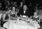 The Hitchcocks and Joan Harrison - Photograph of Alma Reville, Joan Harrison, Alfred Hitchcock and Patricia Hitchcock dining in a New York restaurant, taken in August 1937.