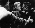To Catch a Thief (1955) - on set - Photograph of Hitchcock directing Cary Grant and Grace Kelly in ''To Catch a Thief''.